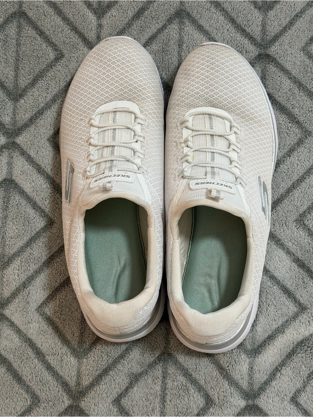 Skechers Women's Off-White Knit Slip-On Sneakers with Silver Accents